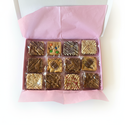Georgie's Bakes open pink gift box containing 12 assorted homemade cookie bars